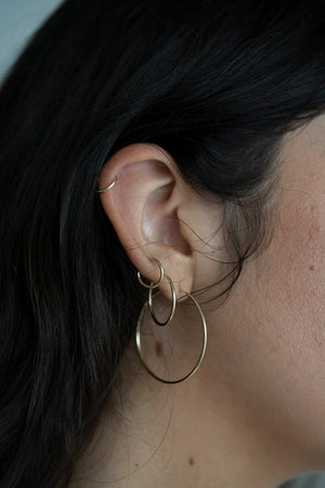 
            
                Load image into Gallery viewer, MAY MARTIN Petite Hoops
            
        